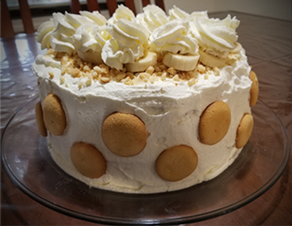 Banana Cream Pudding Cake with vanilla wafers and dreamy whipped cream