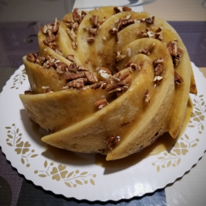 Sock-It-To-Cake with praline sauce and toasted pecans